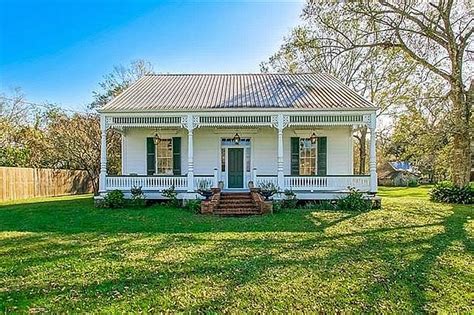 acadian style house with metal roof|acadian houses for sale.